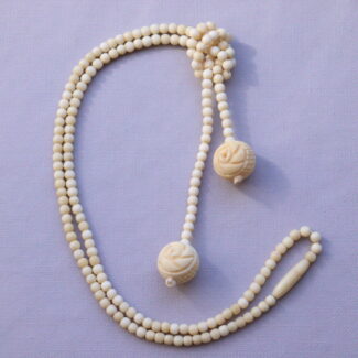 Carved Cow Bone Lariat Necklaces